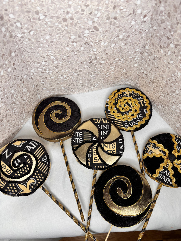 Football theme faux lollipops